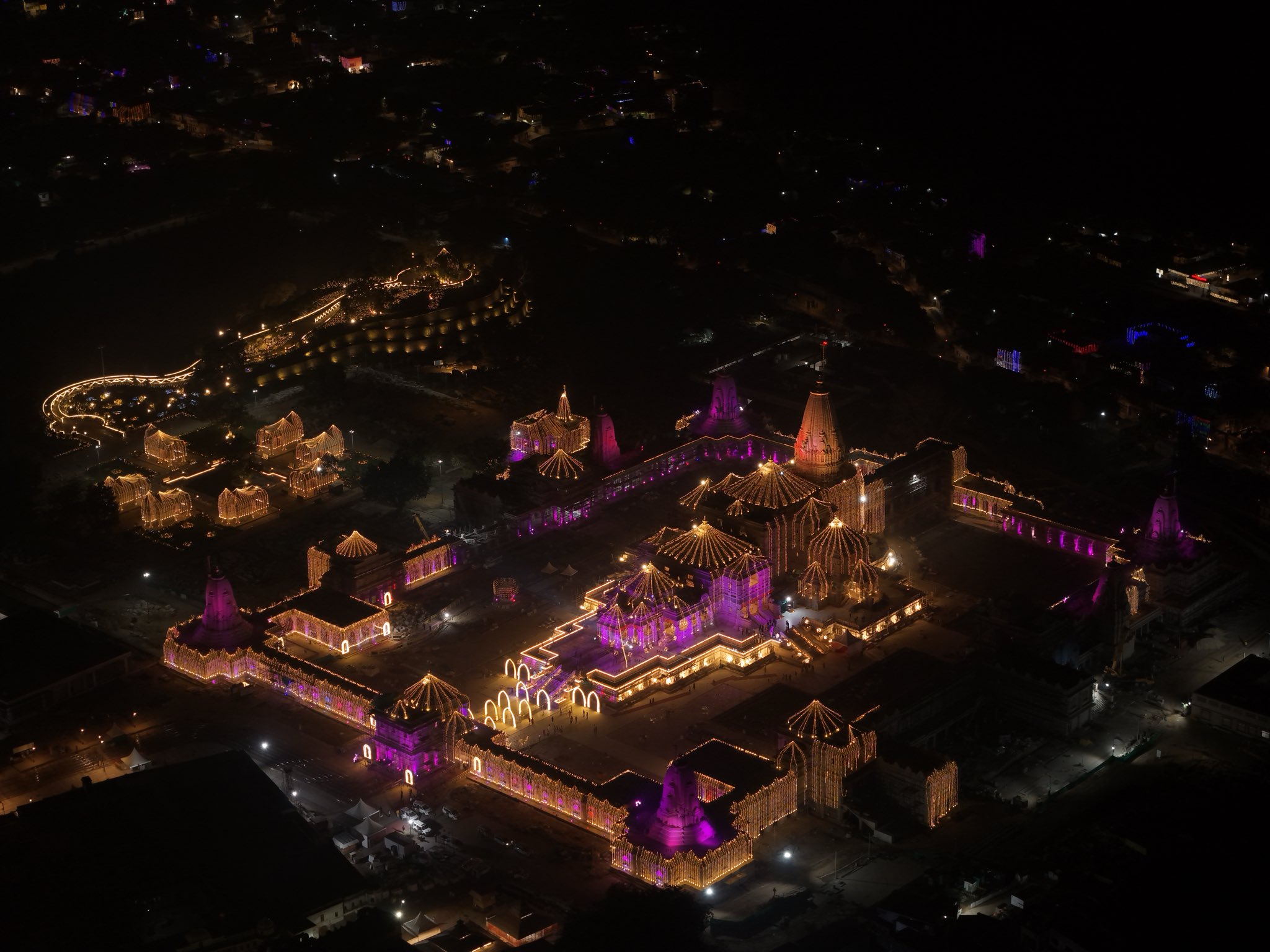 Ram Mandir aerial night view with golden and purple illumination